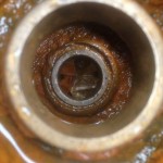 Er zat een stuk plastic in de lenspomp.