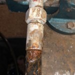 Slang van motorbehuizing naar kachel lek